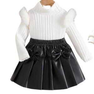 Sweater and leather skirt